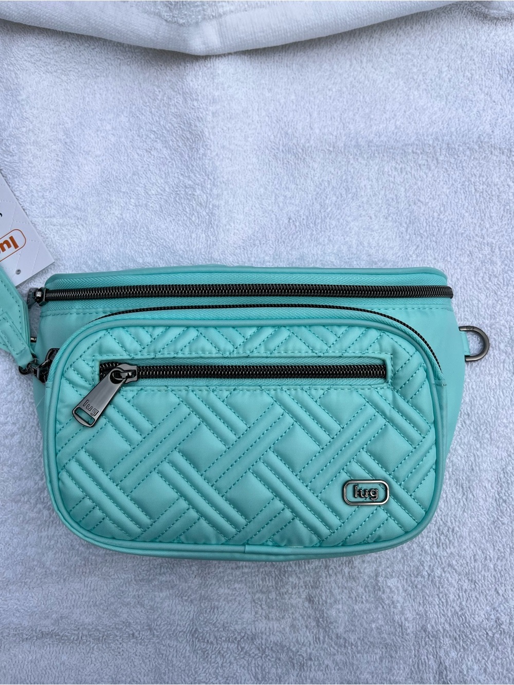 Lug Switchline Sling Bag NWT
Color: Aquamarine
